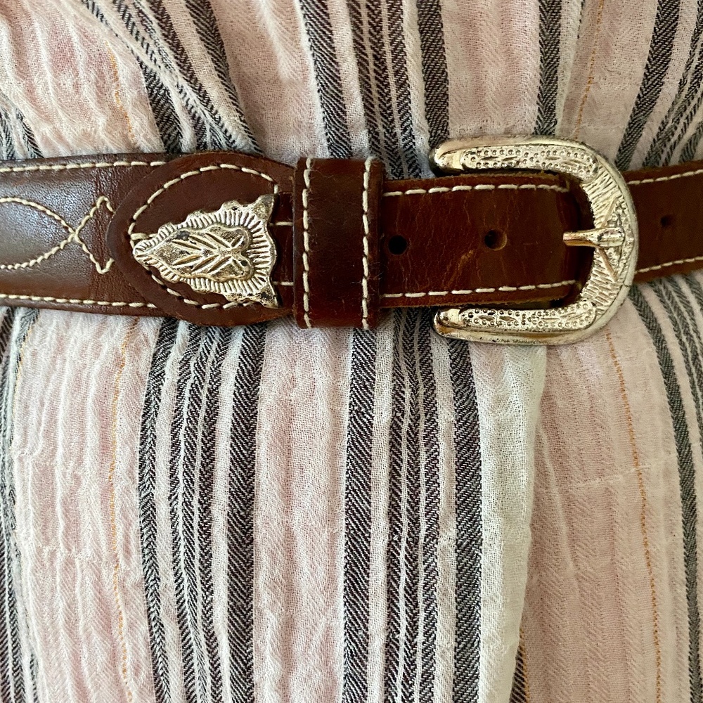 Western style leather belt with silver detailing